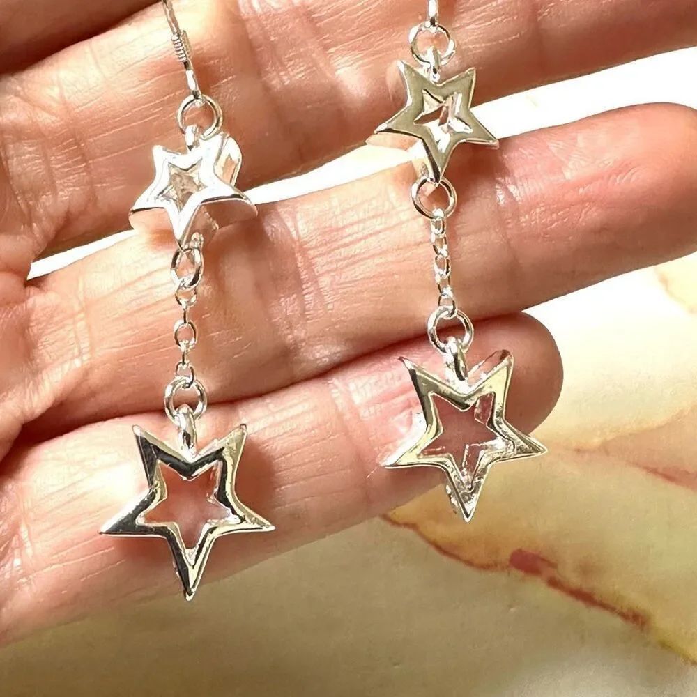 Silver star chain drop earrings